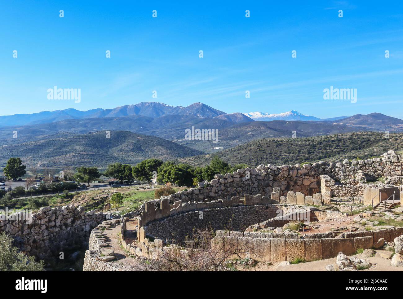 View looking down at Mycenae Greece - The fortified citadel nested over the fertile plain of Argolis near the seashore in the northeast Peloponnese - Stock Photo