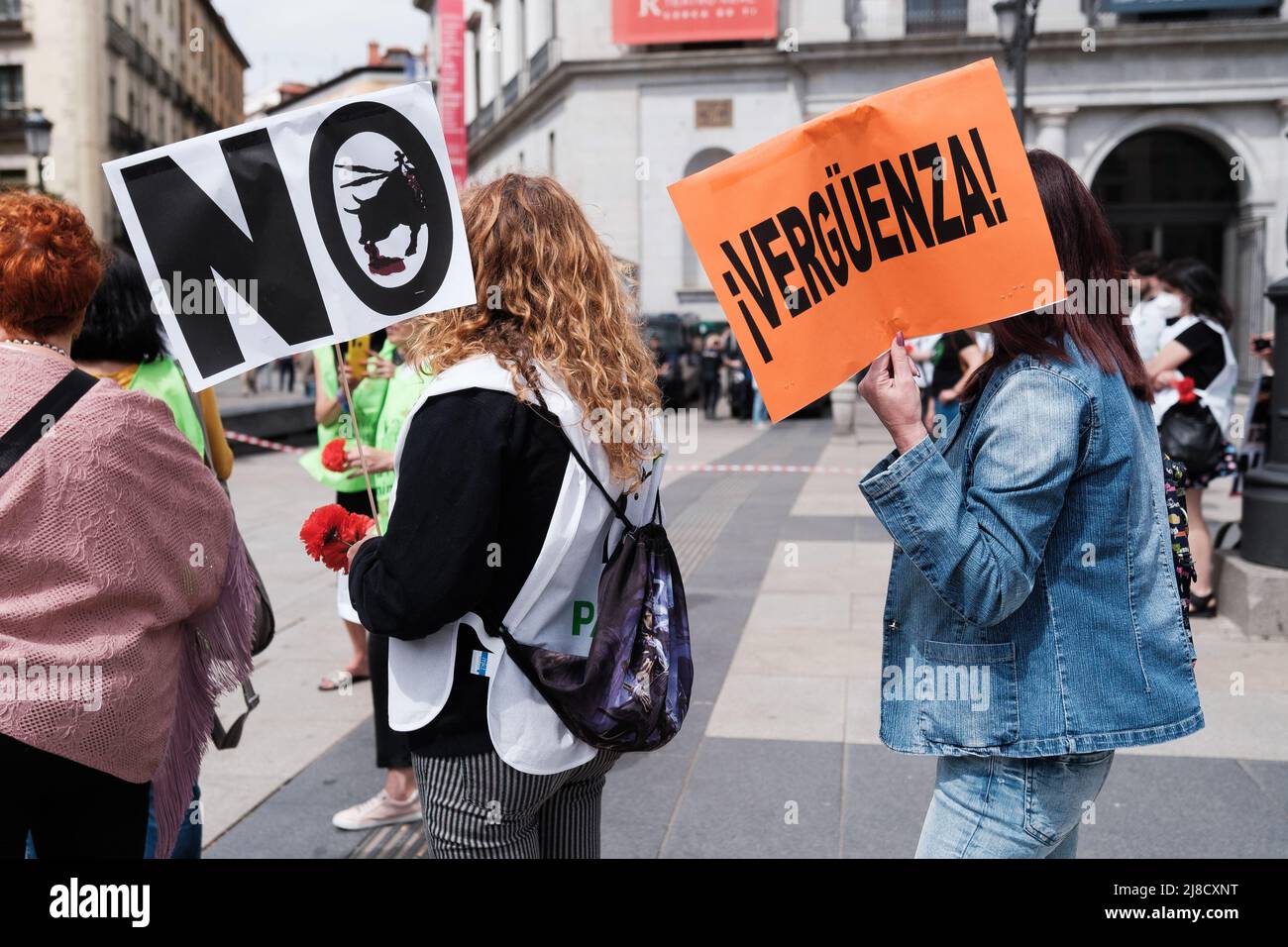 Protesters hold placards expressing their opinions during the anti-bullfighting rally to demand the prohibition of bullfighting at the San Isidro festivities in Madrid. (Photo by Atilano Garcia / SOPA Images/Sipa USA) Stock Photo