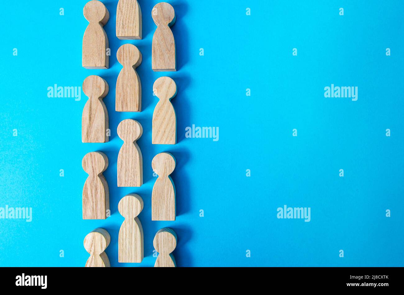 A strip of ordered figures of people. Queue line. Movement in one direction. human capital. Discipline. Social organization, joining consolidated forc Stock Photo