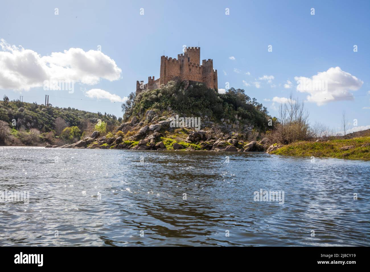 View from the banks of the Tajo River towards Almourol Castle, situated in the middle of an island. Center of Portugal Stock Photo