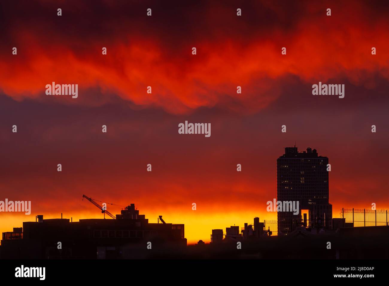 Sunset of Williamsburg, Brooklyn with the 260 Kent building in view. New Yok Metro Area Stock Photo
