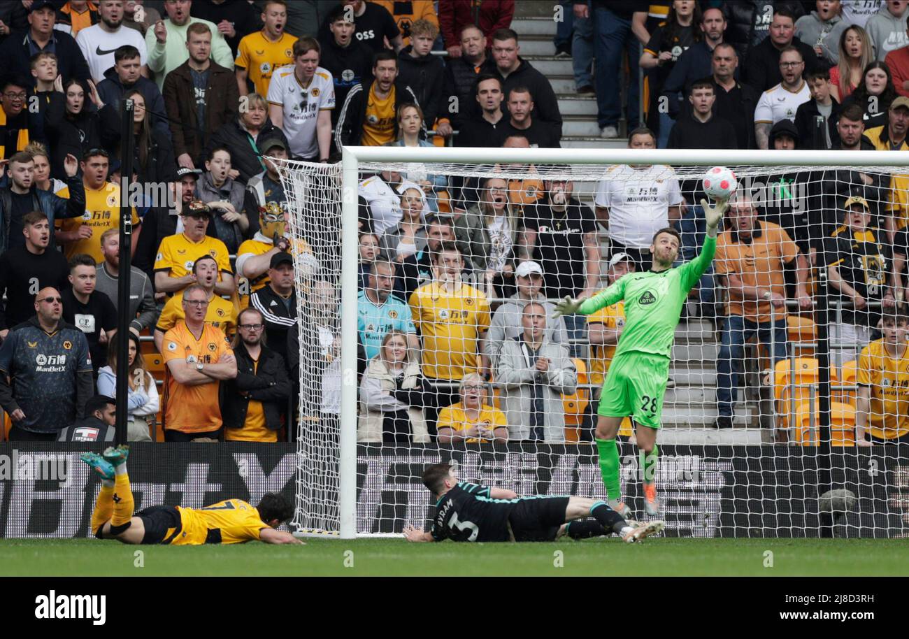 Wolverhampton,  West Midlands, UK. 15th May 2022 ; Molineux Stadium, Wolverhampton,  West Midlands, England; Premier League football, Wolverhampton Wanderers versus Norwich ; Angus Gunn of Norwich City saves from Lomba Pedro Neto of Wolverhampton Wanderers Stock Photo