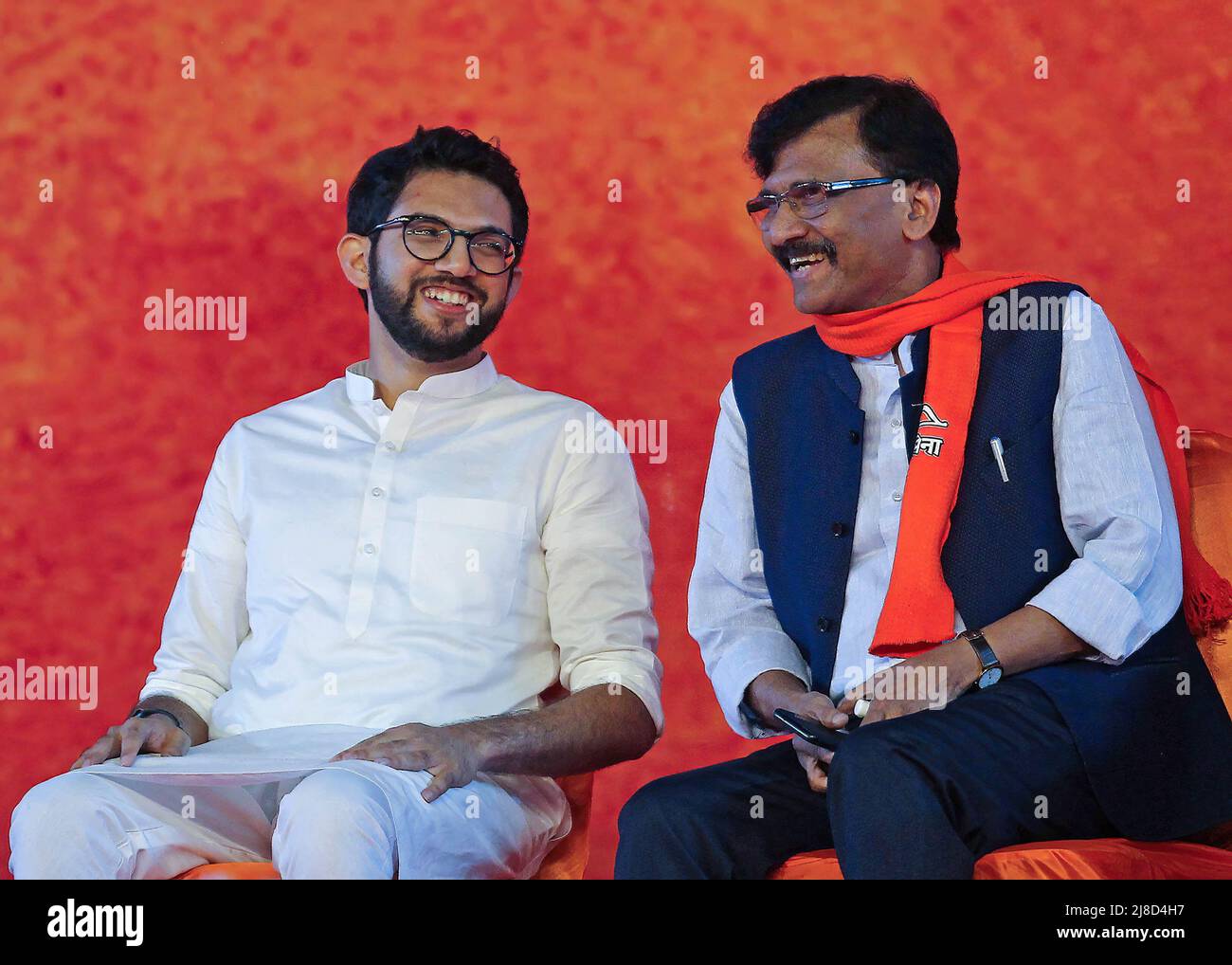 L-R Cabinet Minister of Tourism and Environment (Maharashtra), Aditya Thackeray and Sanjay Raut, Shiv Sena Member of Parliament (Maharashtra) share a laugh during the Shiv Sena rally. The rally marked the beginning of the party's second phase of 'Shiv Sampark Abhiyan' party's outreach programme with the voters and karyakartas (workers). Stock Photo