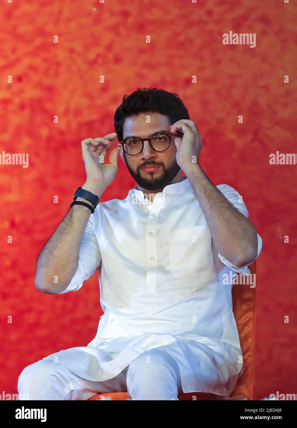 Cabinet Minister of Tourism and Environment (Maharashtra), Aditya Thackeray adjust his spectacles during the Shiv Sena rally. The rally marked the beginning of the party's second phase of 'Shiv Sampark Abhiyan' party's outreach programme with the voters and karyakartas (workers). Stock Photo