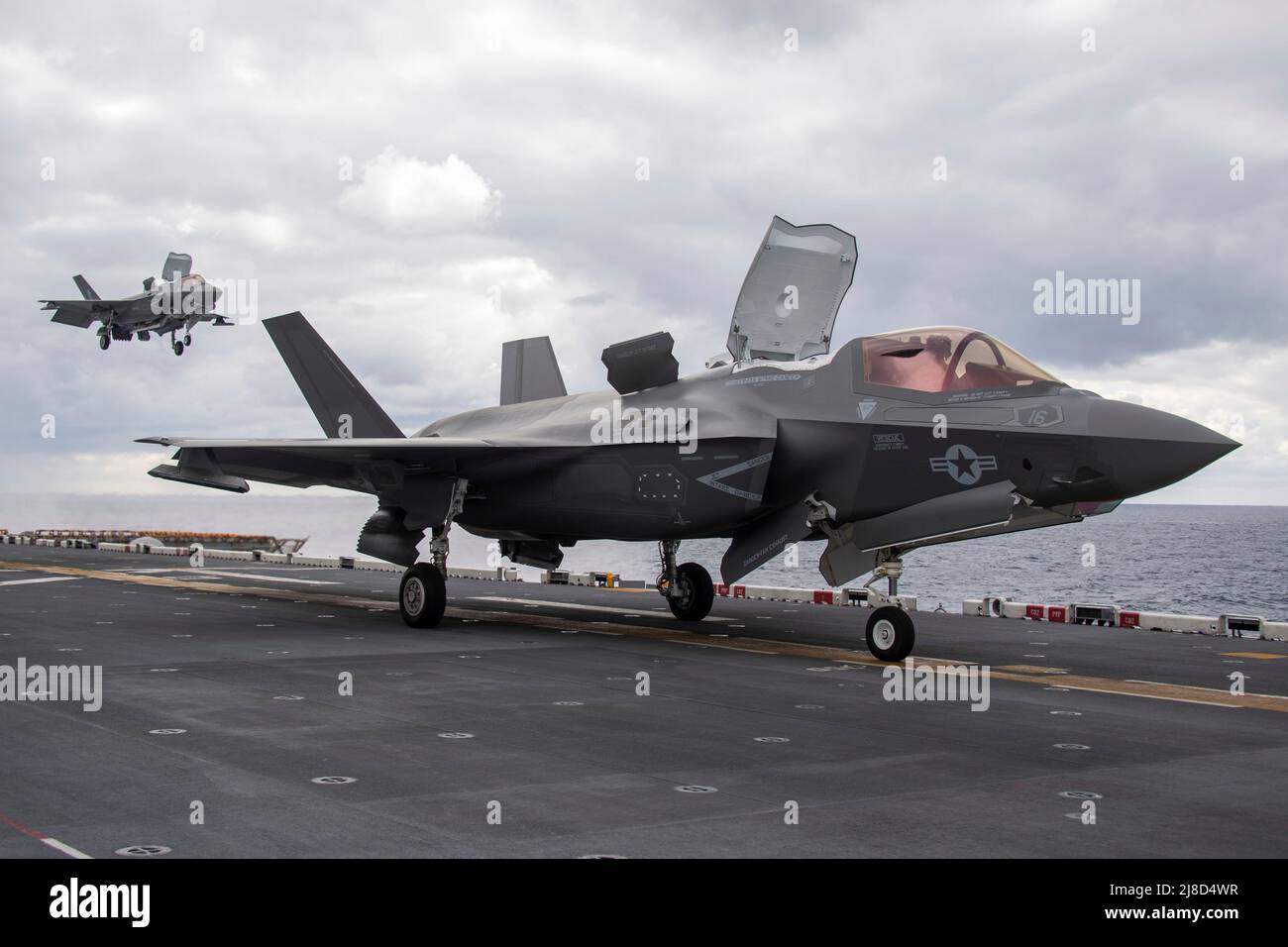 A U.S. Marine Corps F-35B Lightning II fighter aircraft, attached to the Dragons of Marine Medium Tiltrotor Squadron 265, launches from the flight deck of the America-class amphibious assault ship USS America, January 9, 2021 operating on the Philippine Sea. Stock Photo