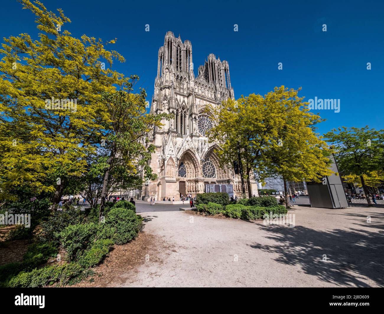 The image is of the famous 13th century Cathedral Notre Dame des Reims famed for its association with Joan of Arc, that overlooks the city square. Stock Photo