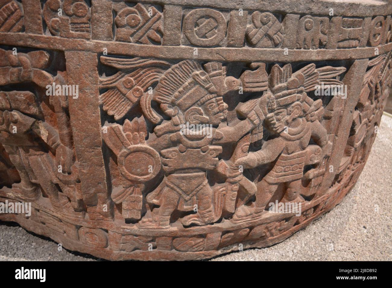 Stone with scenes of conquest know with several names Piedra de Moctezuma I, Piedra de Tezcatlipoca or of the Ex-Arzobispado. Mexica Culture, MNA. Stock Photo