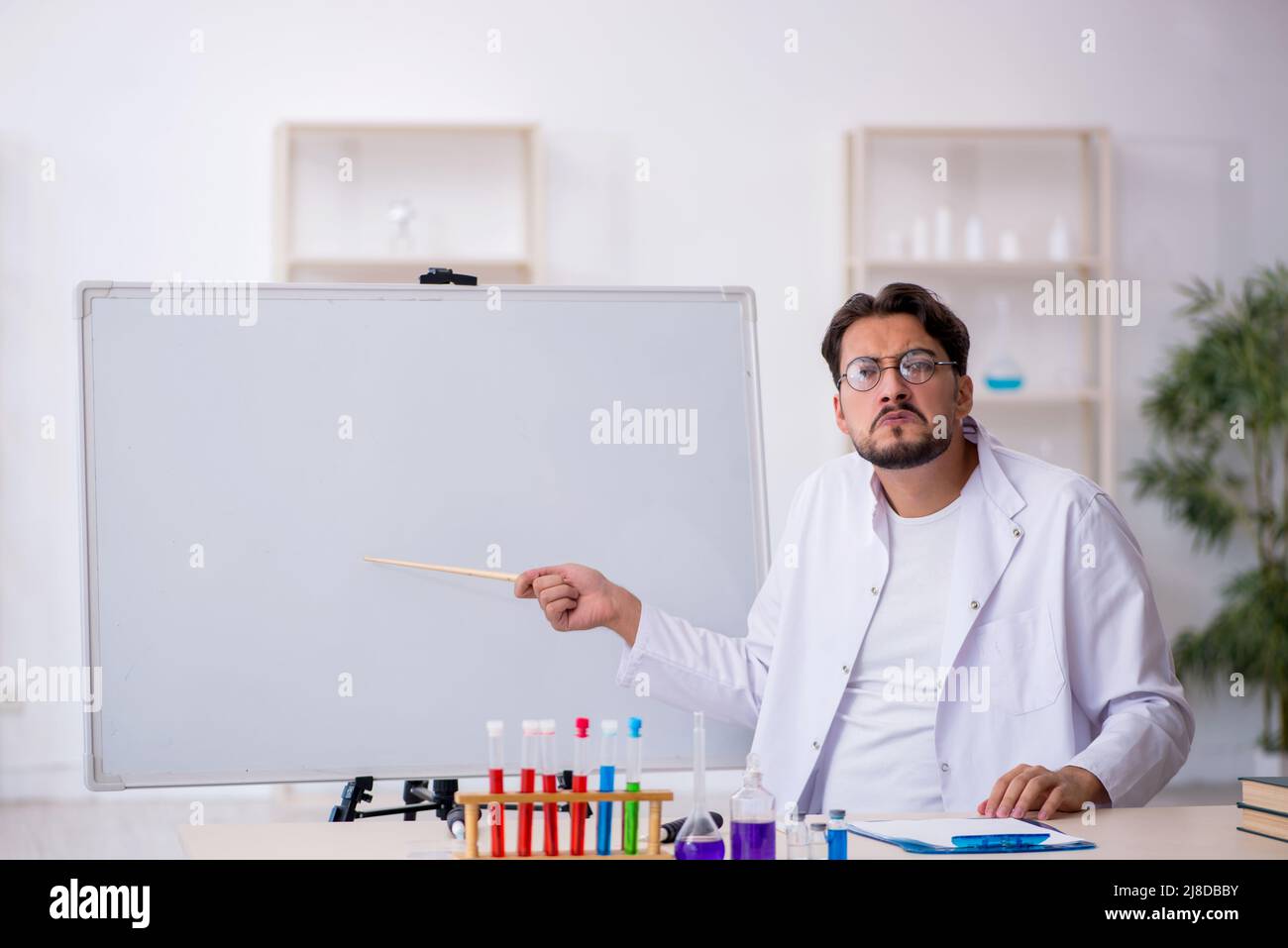 Angry pointing doctor young man hi-res stock photography and images - Alamy