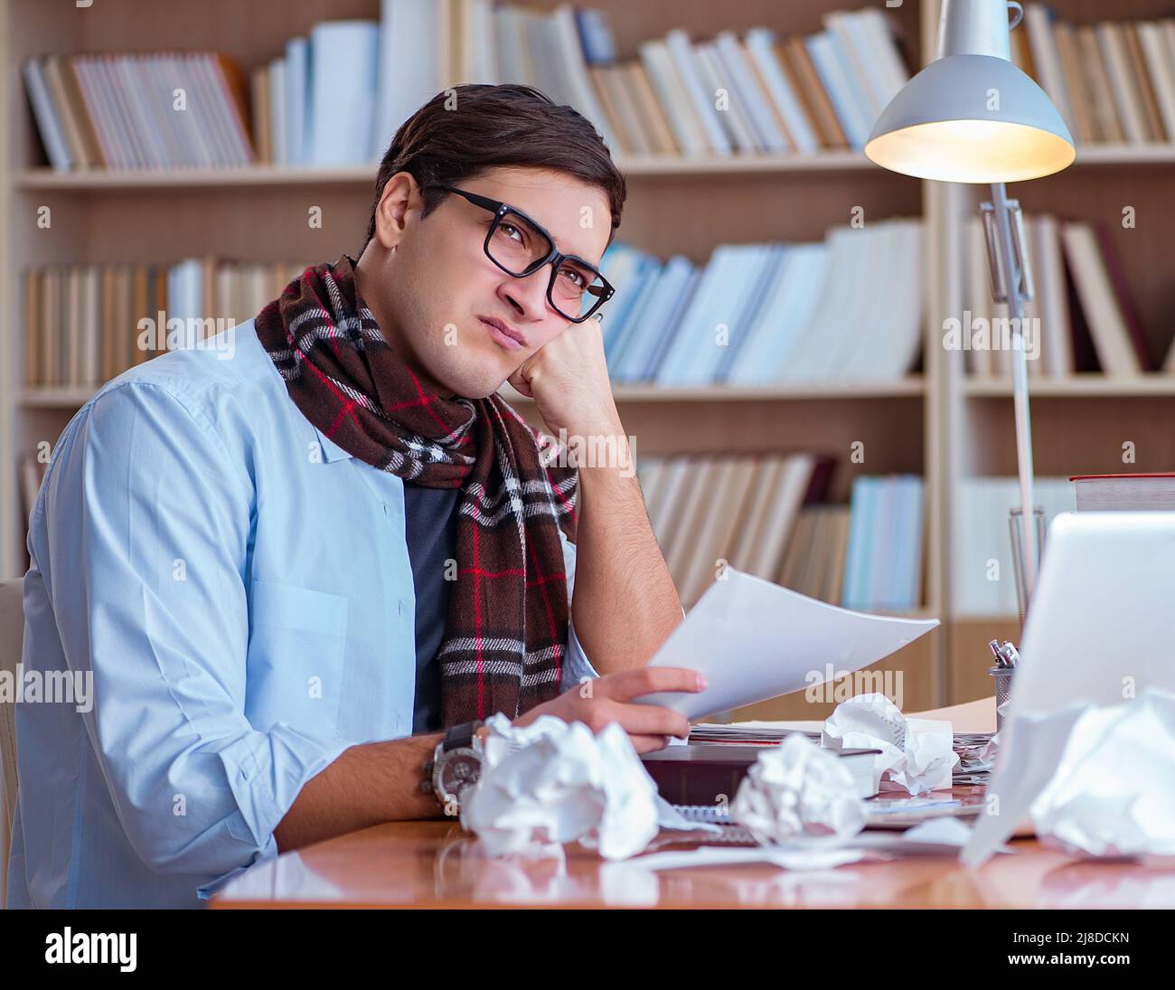 Writer In Library Struggling to study in library hi-res stock photography and images - Alamy