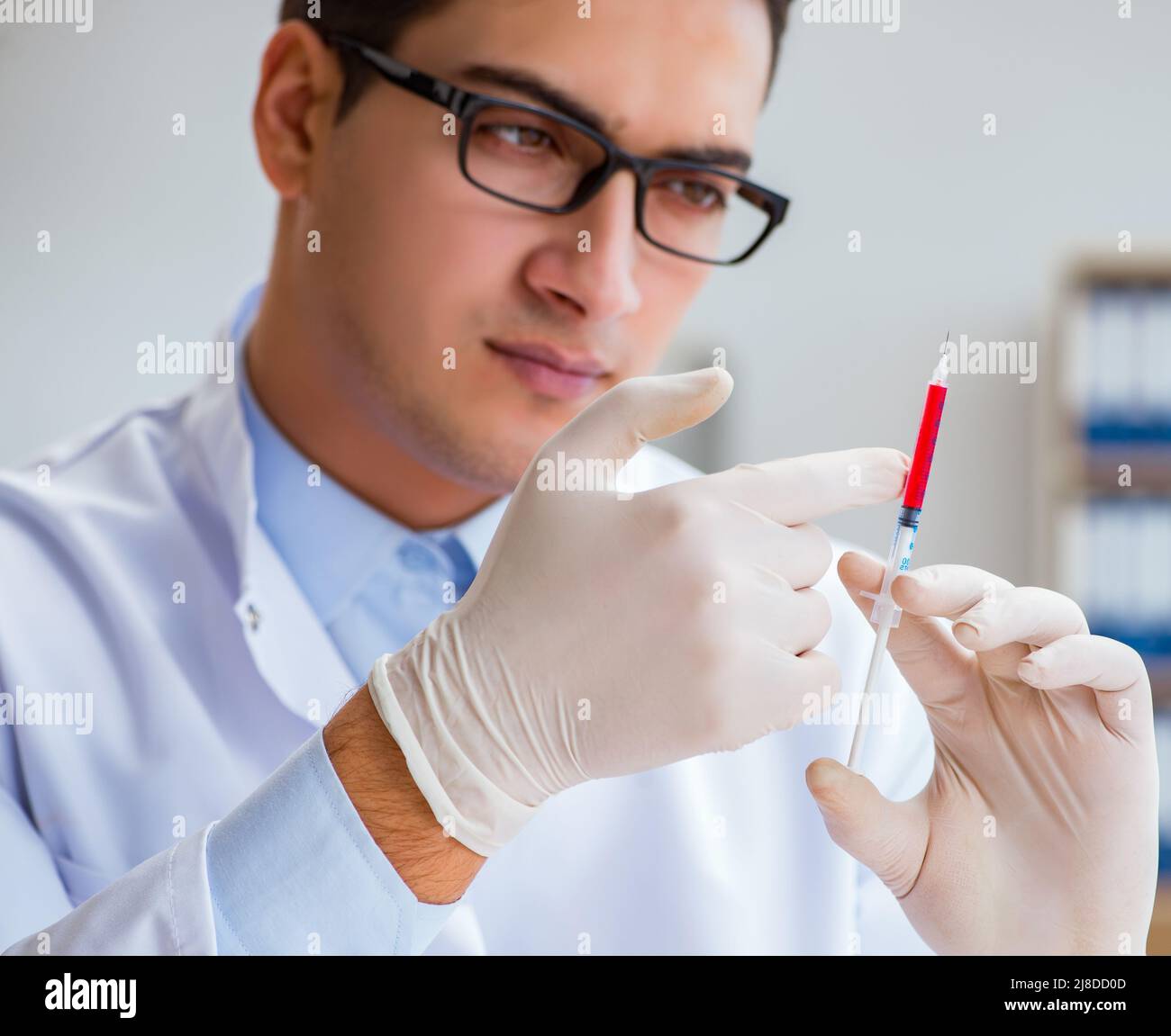 The doctor working with blood samples Stock Photo Alamy