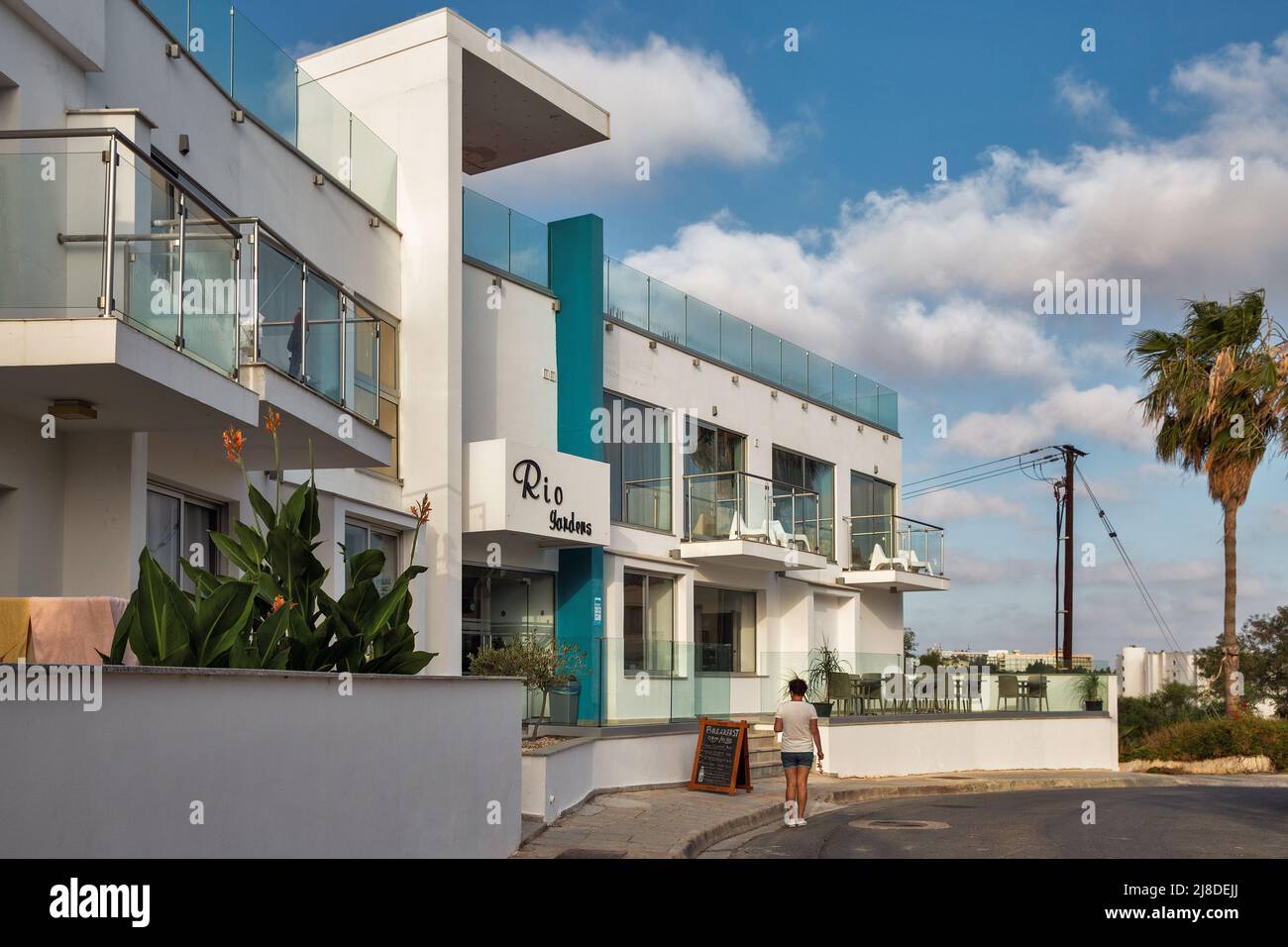 Ayia Napa, Cyprus - May 28, 2021: Modern small hotel Rio Gardens facade in a resort town. Ayia Napa is a tourist resort at the far eastern end of the Stock Photo