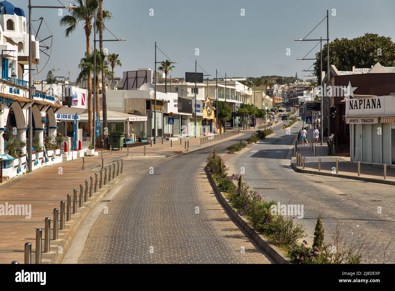 Ayia Napa, Cyprus - May 31, 2021: Archiepieskopou Makariou III street in downtown. Ayia Napa is a tourist resort at the far eastern end of the souther Stock Photo