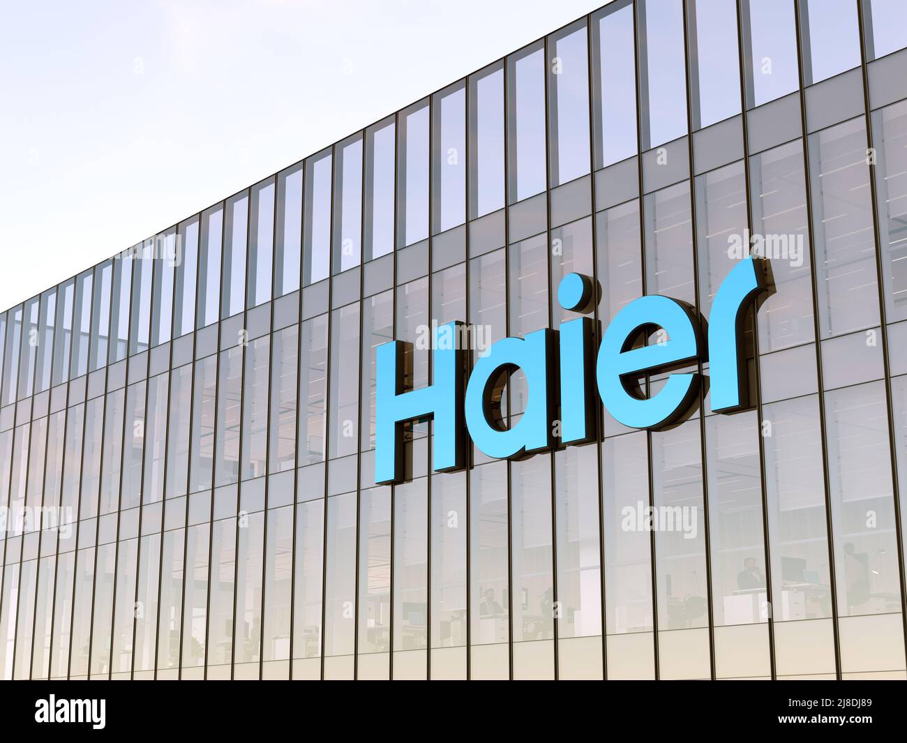 Qingdao, China. May 2, 2022. Editorial Use Only, 3D CGI. Haier Signage Logo on Top of Glass Building. Workplace of Home Appliance Company Office Headq Stock Photo