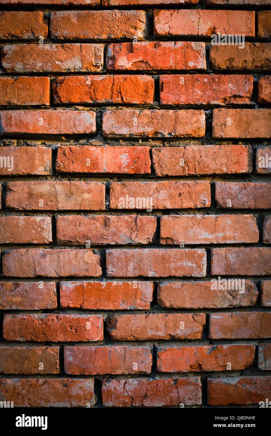 Background is wall old red burnt brick Stock Photo