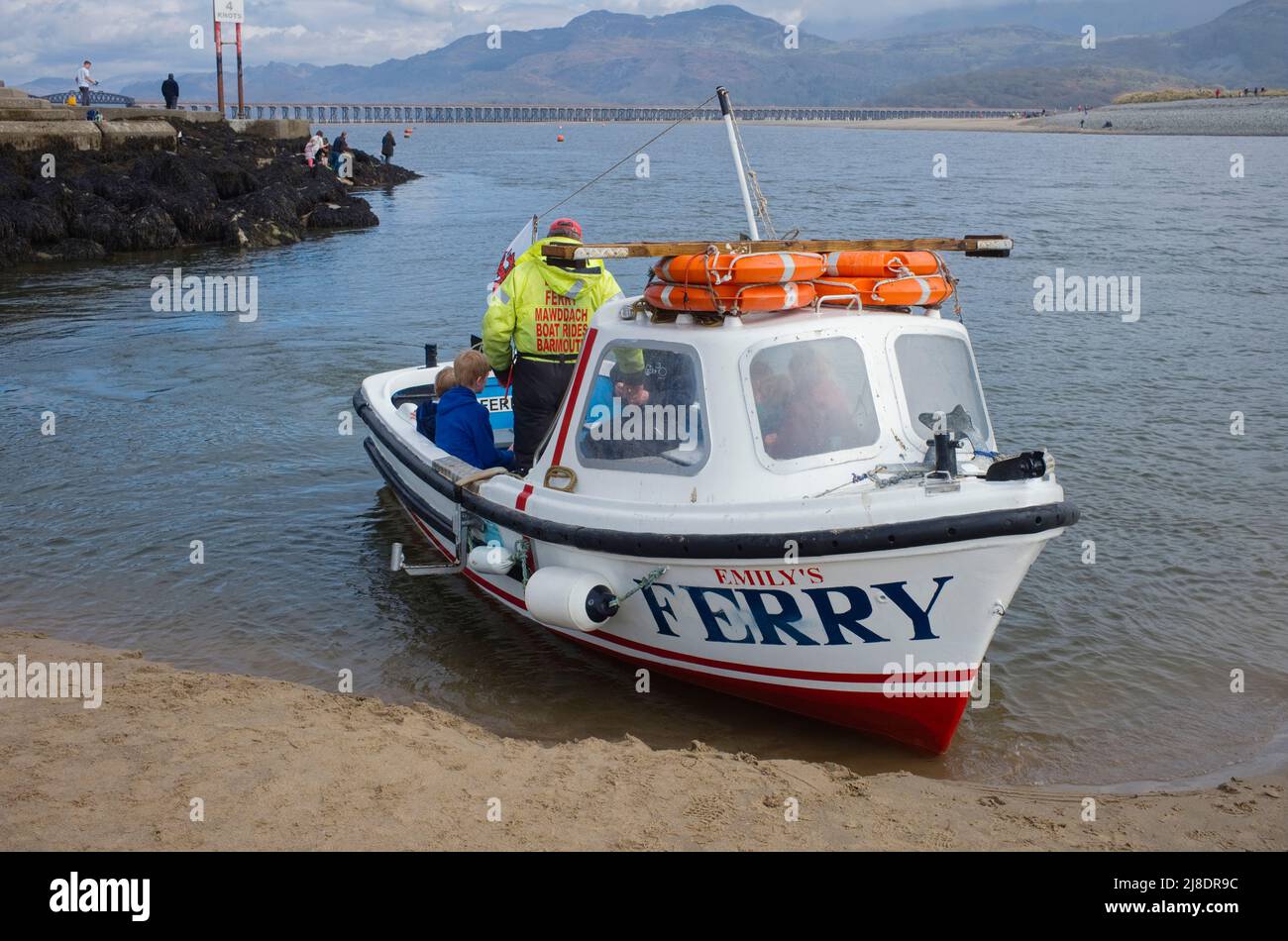 The ferry across the estuary at Barmouth in North Wales Stock Photo