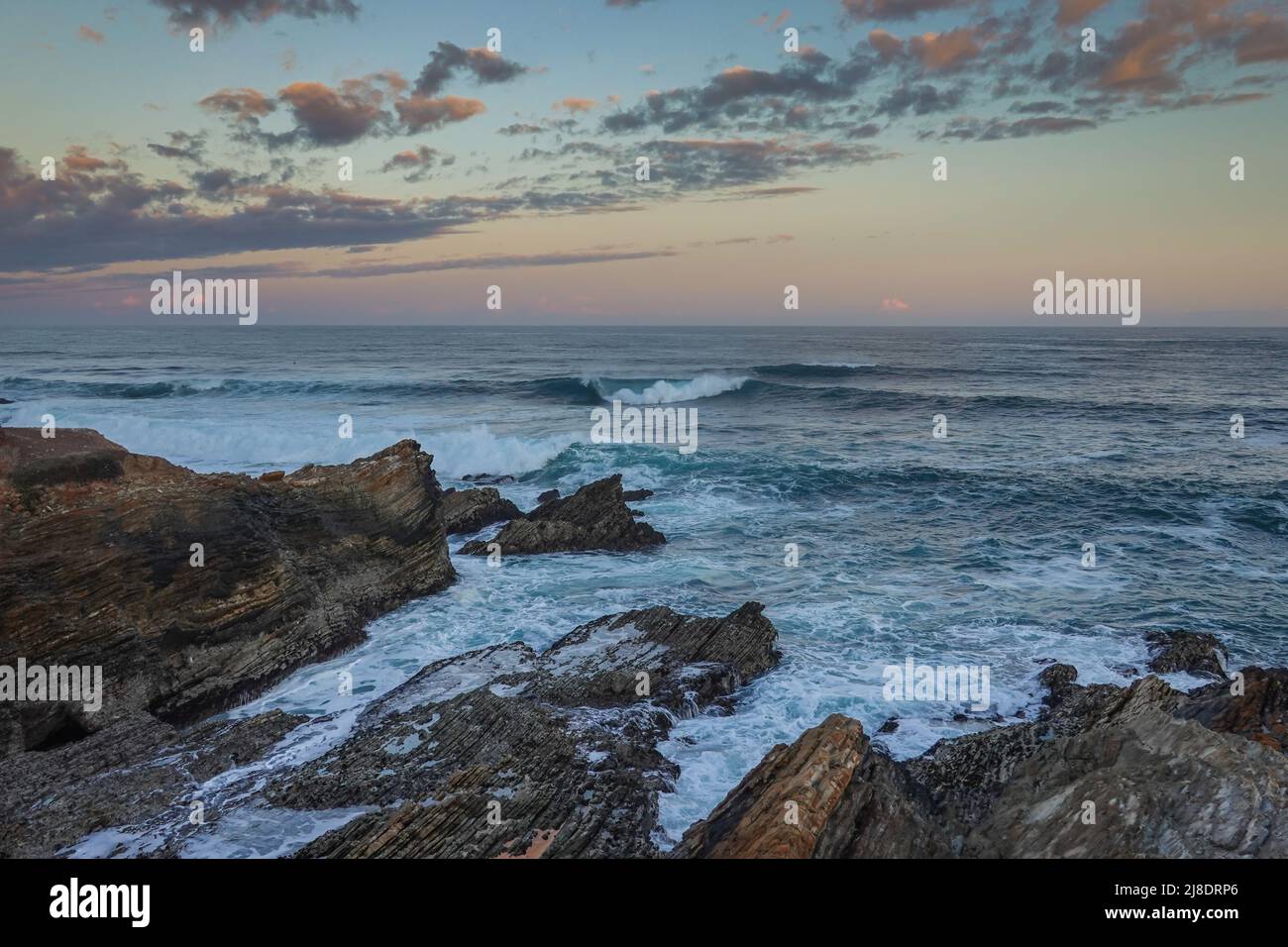 crashing waves along the rocky bluff trail in Montaña de Oro State Park .San Luis Obispo County, California , USA Stock Photo