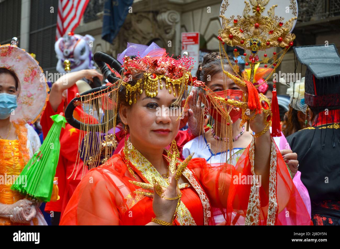 Participant is seen wearing Malaysian costume, marches down on Sixth Avenue during the first ever Asian American and Pacific Islander Cultural and Her Stock Photo