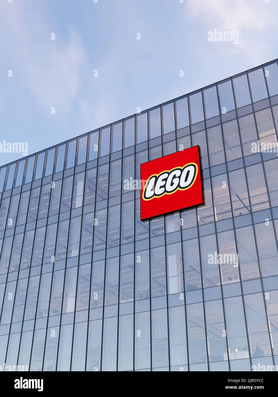 Billund, Denmark. May 2, 2022. Editorial Use Only, 3D CGI. The Lego Group Signage Logo on Top of Glass Building. Workplace Toy Company Office Headquar Stock Photo