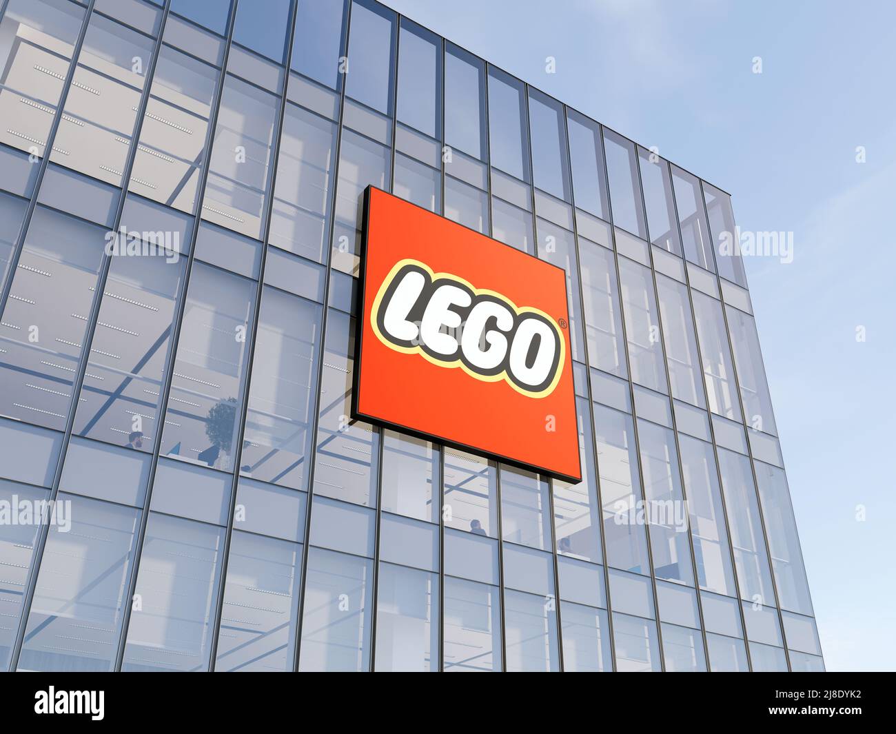 Billund, Denmark. May 2, 2022. Editorial Use Only, 3D CGI. The Lego Group Signage Logo on Top of Glass Building. Workplace Toy Company Office Headquar Stock Photo