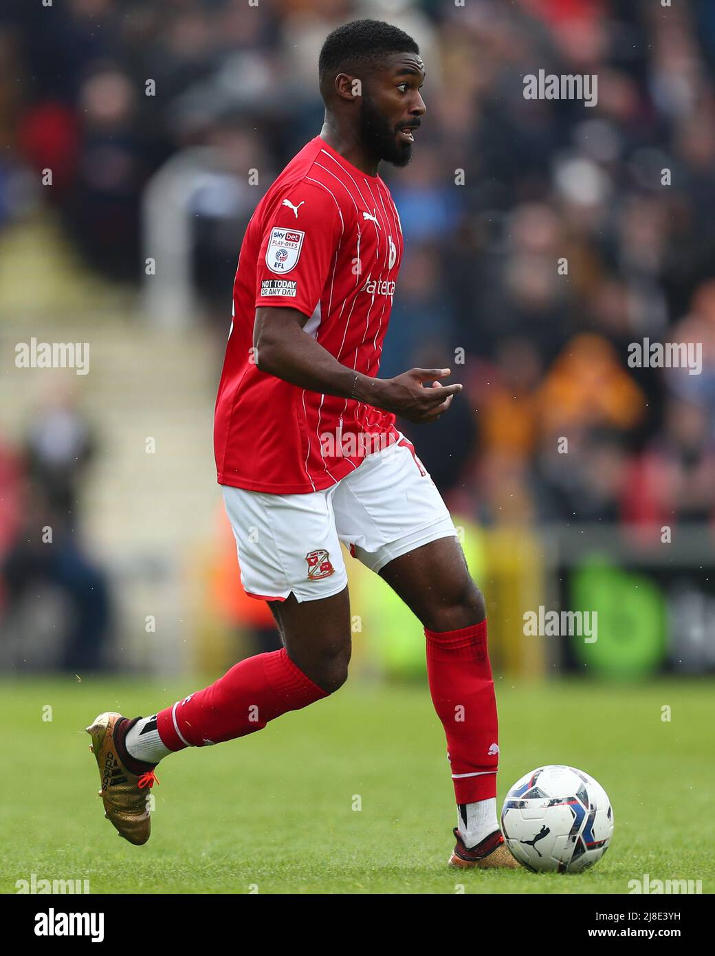 SWINDON, UK. MAY 15TH Mandela Egbo of Swindon Town pictured with the ball during the Sky Bet League 2 Play-Off Semi-Final 1st Leg between Swindon Town and Port Vale at the County Ground, Swindon on Sunday 15th May 2022. (Credit: Kieran Riley | MI News) Credit: MI News & Sport /Alamy Live News Stock Photo