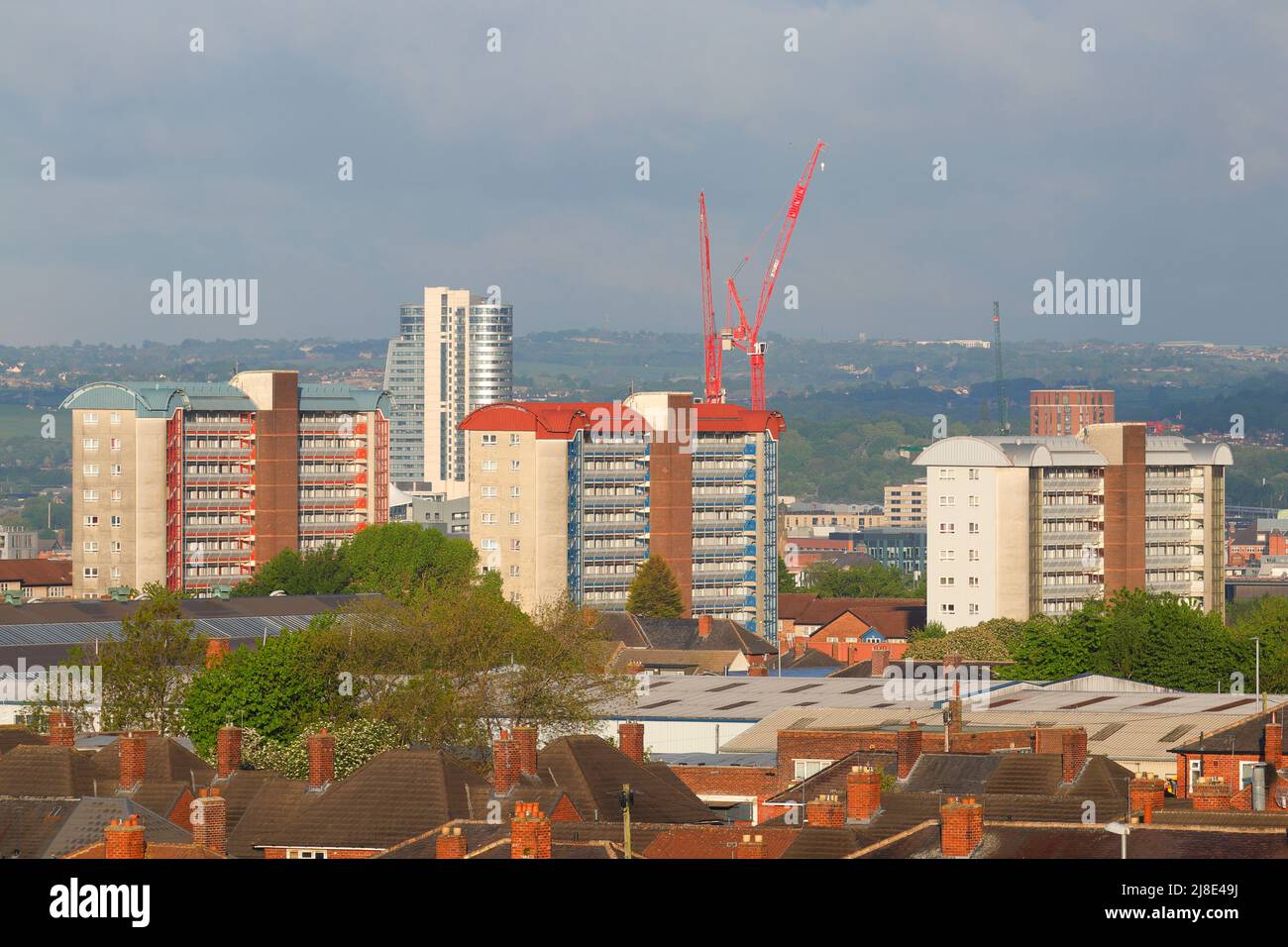 Leeds with Bridgewater Place dubbed The Dalek. Low rise flats in the foreground are Saville Green,Appleton Court and Appleton Close Stock Photo