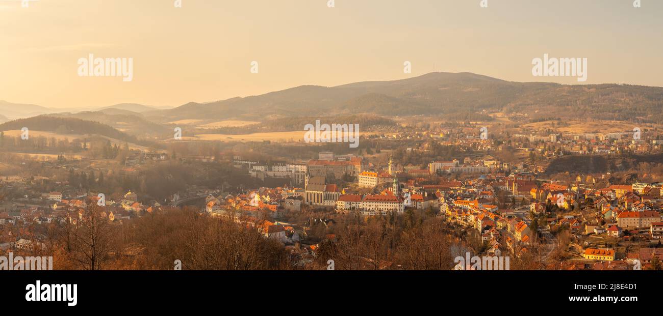 the town of Cesky Krumlov in the valley of the countryside, the Klet mountain on the horizon, Czech republic Stock Photo