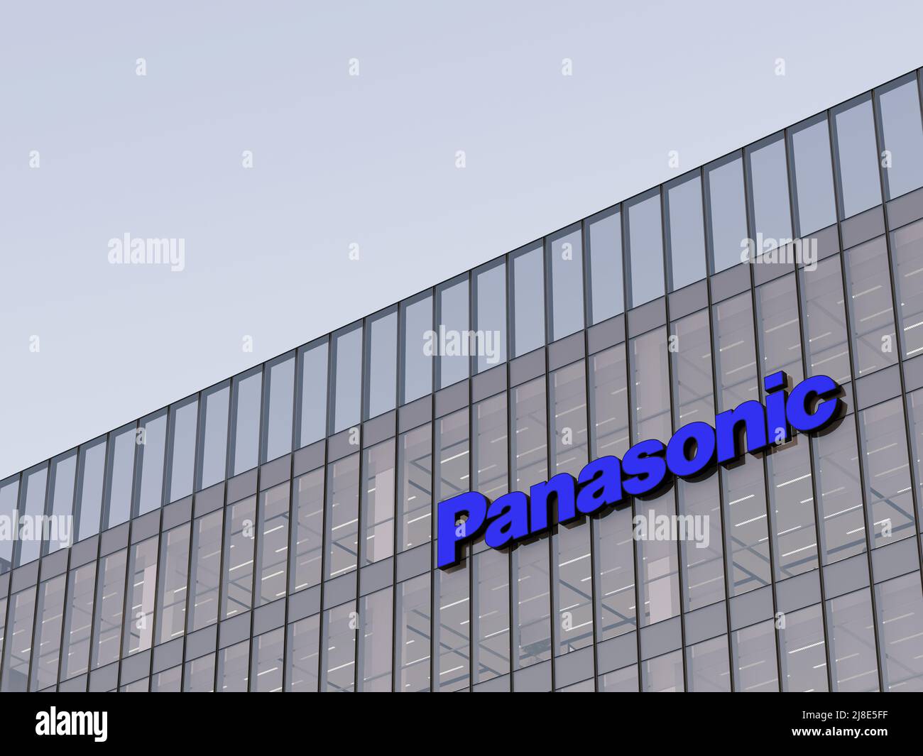 Kadoma, Osaka, Japan. May 2, 2022. Editorial Use Only, 3D CGI. Panasonic Signage Logo on Top of Glass Building. Workplace Multinational Industrial Con Stock Photo