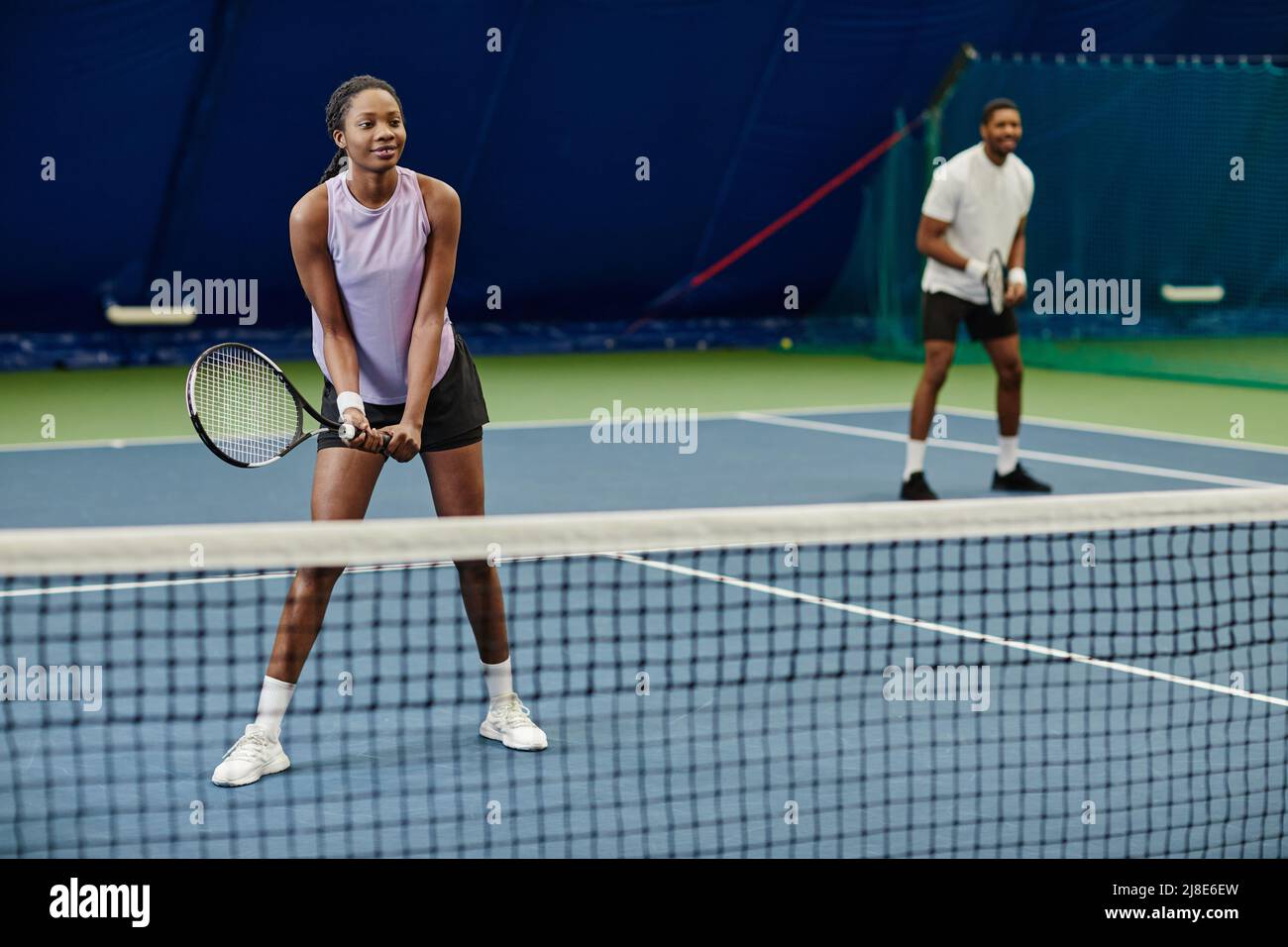 Black female playing tennis hi-res stock photography and images - Alamy