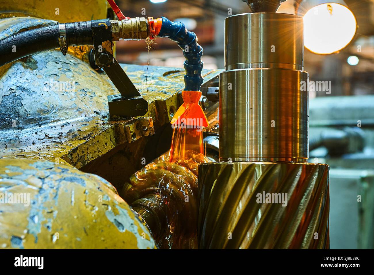 Processing helical gear with old modular hob machine tool Stock Photo