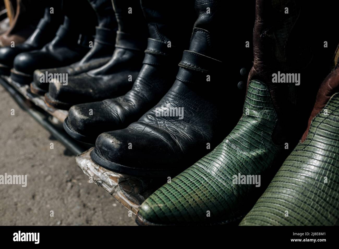 Old cowboy boots hi-res stock photography and images - Alamy