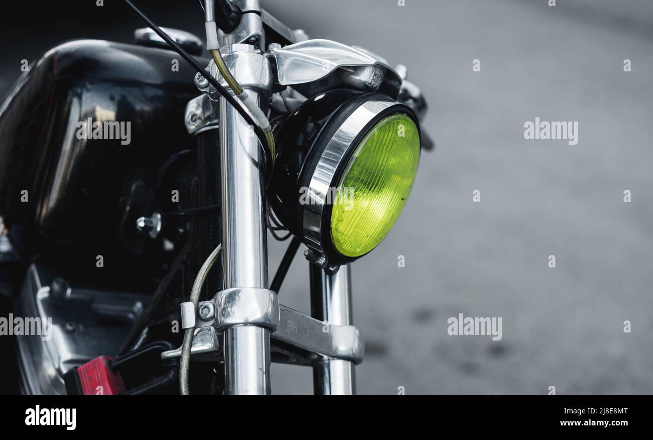 Vintage round headlight on motorcycle. retro chopper Stock Photo - Alamy