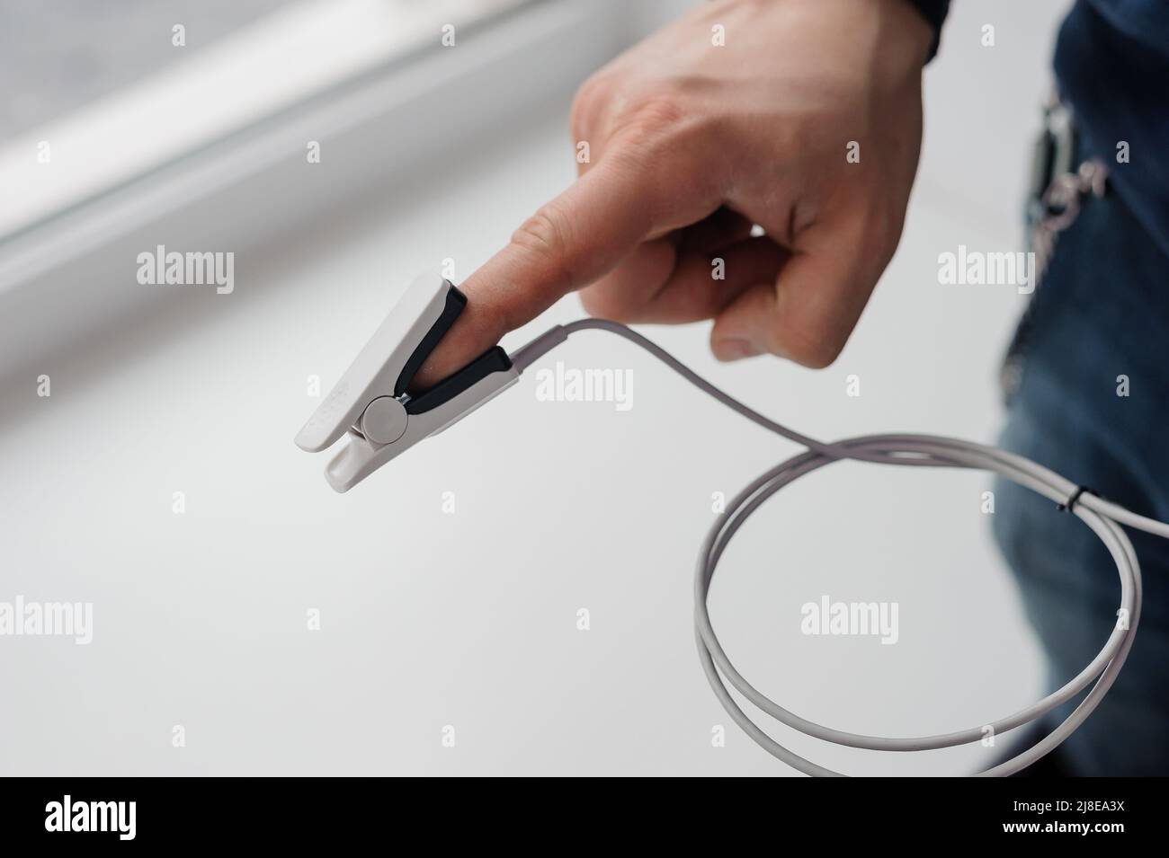Pulse oximeter on a white background. Medical monitoring and diagnostic