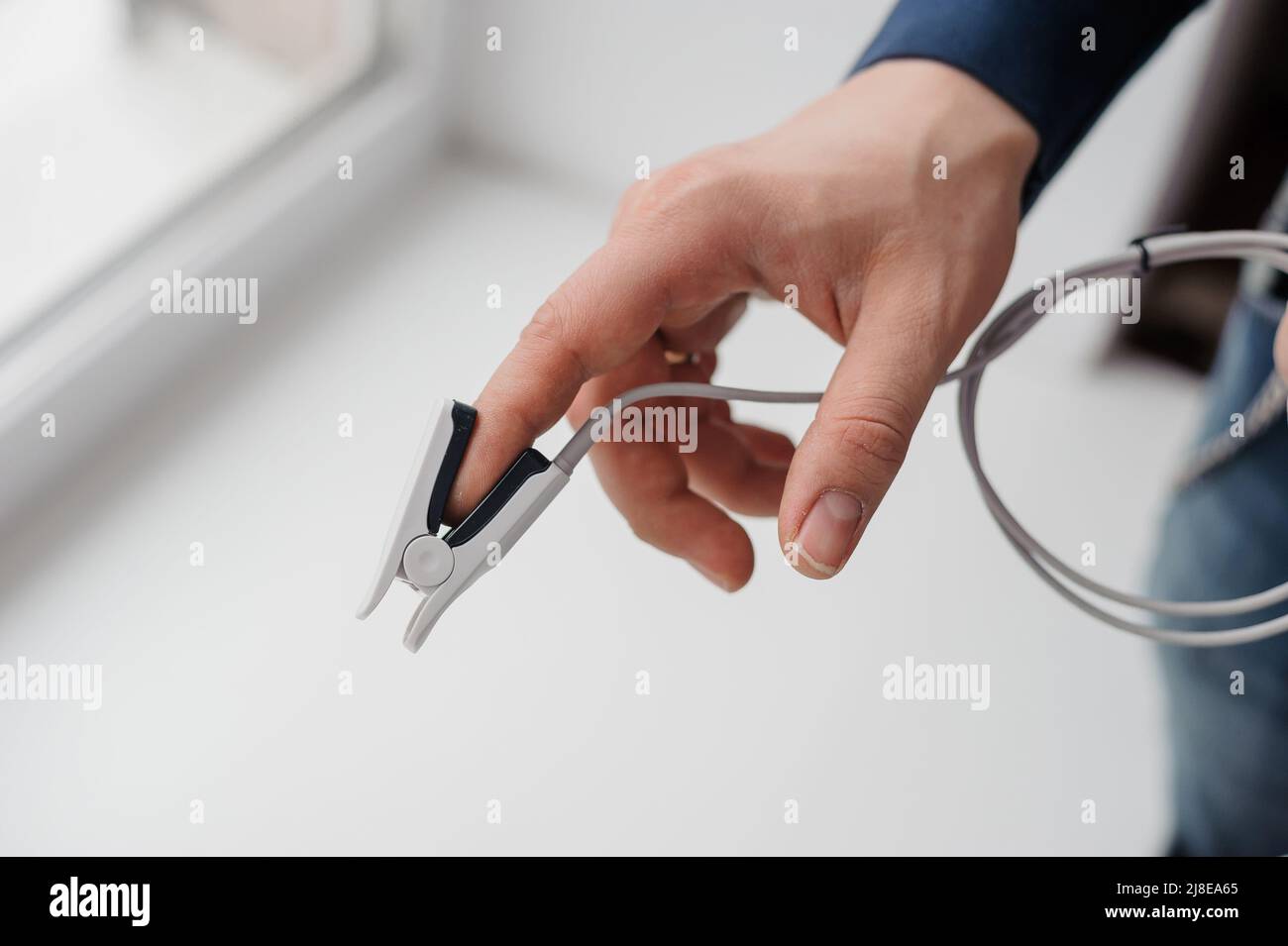 Pulse oximeter on a white background. Medical monitoring and diagnostic