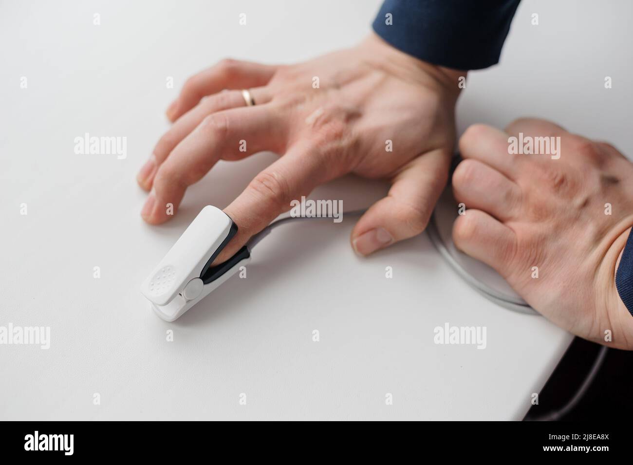 Pulse oximeter on a white background. Medical monitoring and diagnostic