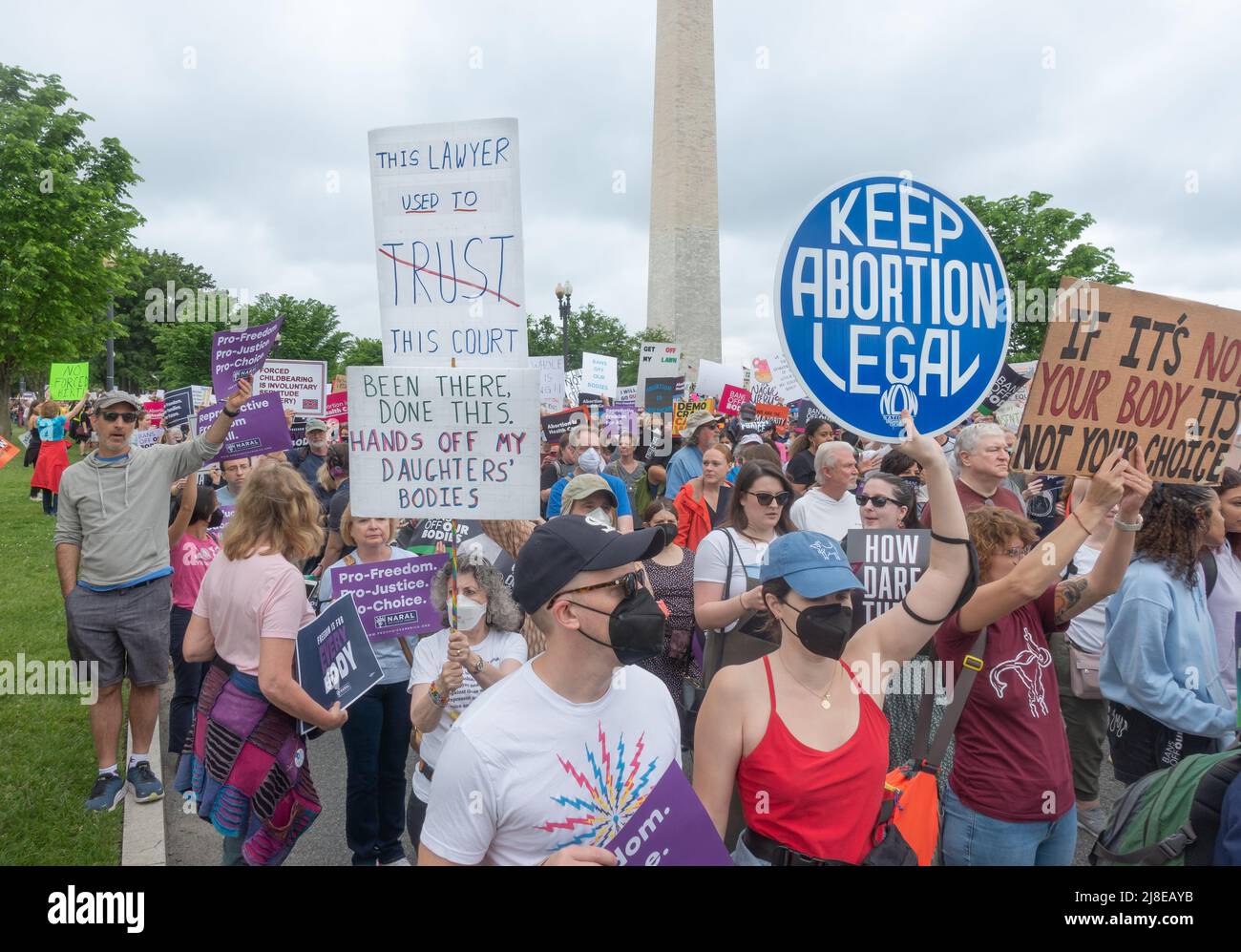 May 14, 2022: Pro-choice demonstrators leave rally to march to the Supreme Court, part of  “Bans of Our Bodies” day of action protesting an anticipated Court ruling to overturn Roe v Wade. The goal is to support abortion rights and urge elected officials to protect access to abortion through legislation. Stock Photo