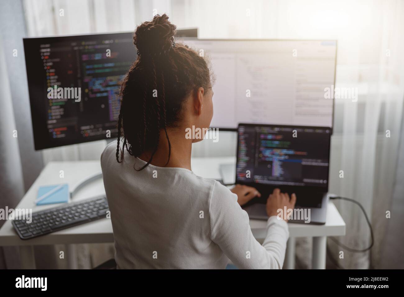 Female programer hi-res stock photography and images - Alamy