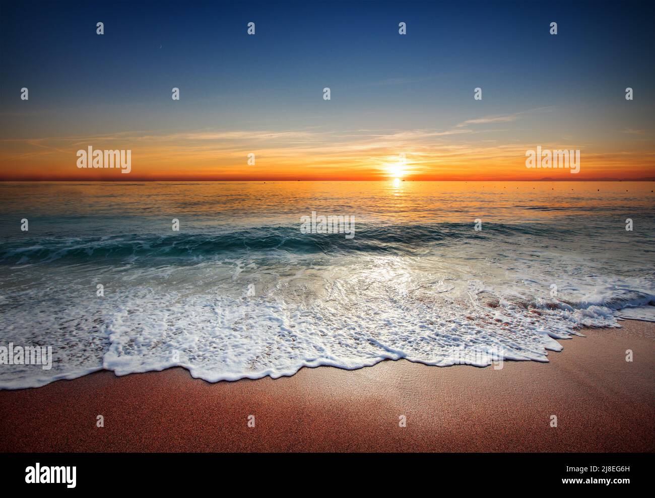 Beautiful beach at sunset time Stock Photo