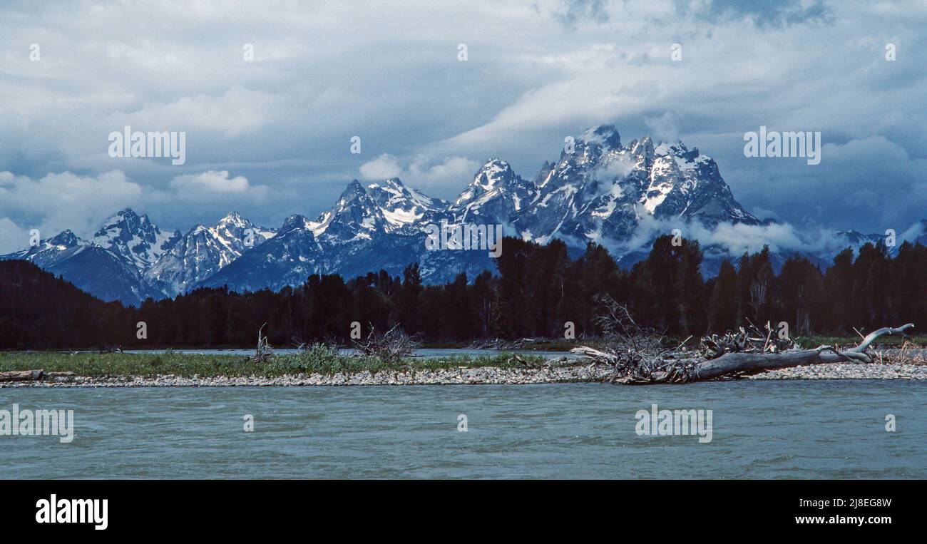 Panoramic view of the Grand Teton mountain range from the nearby Snake River. Stock Photo