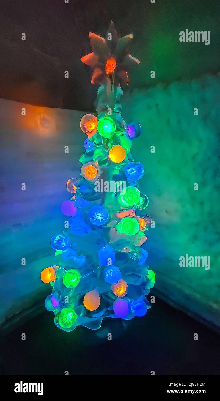 Christmas tree carved of ice on display at Chena Hot Springs Resort's Ice Museum. Outside Fairbanks, AK. Stock Photo
