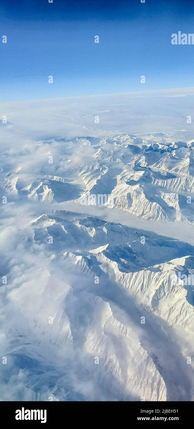Aerial view of mountains and glacier from jet leaving Fairbanks, Alaska, USA Stock Photo