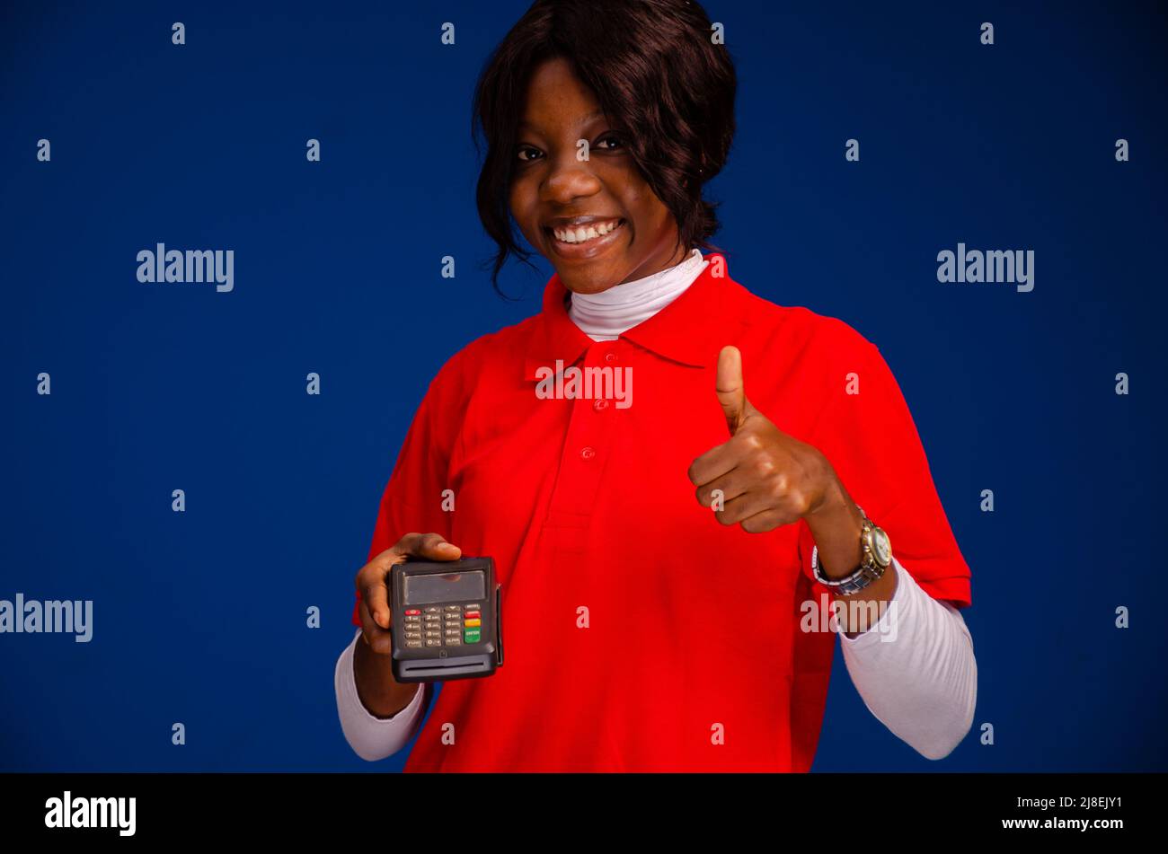 Black person using pos hi-res stock photography and images - Alamy
