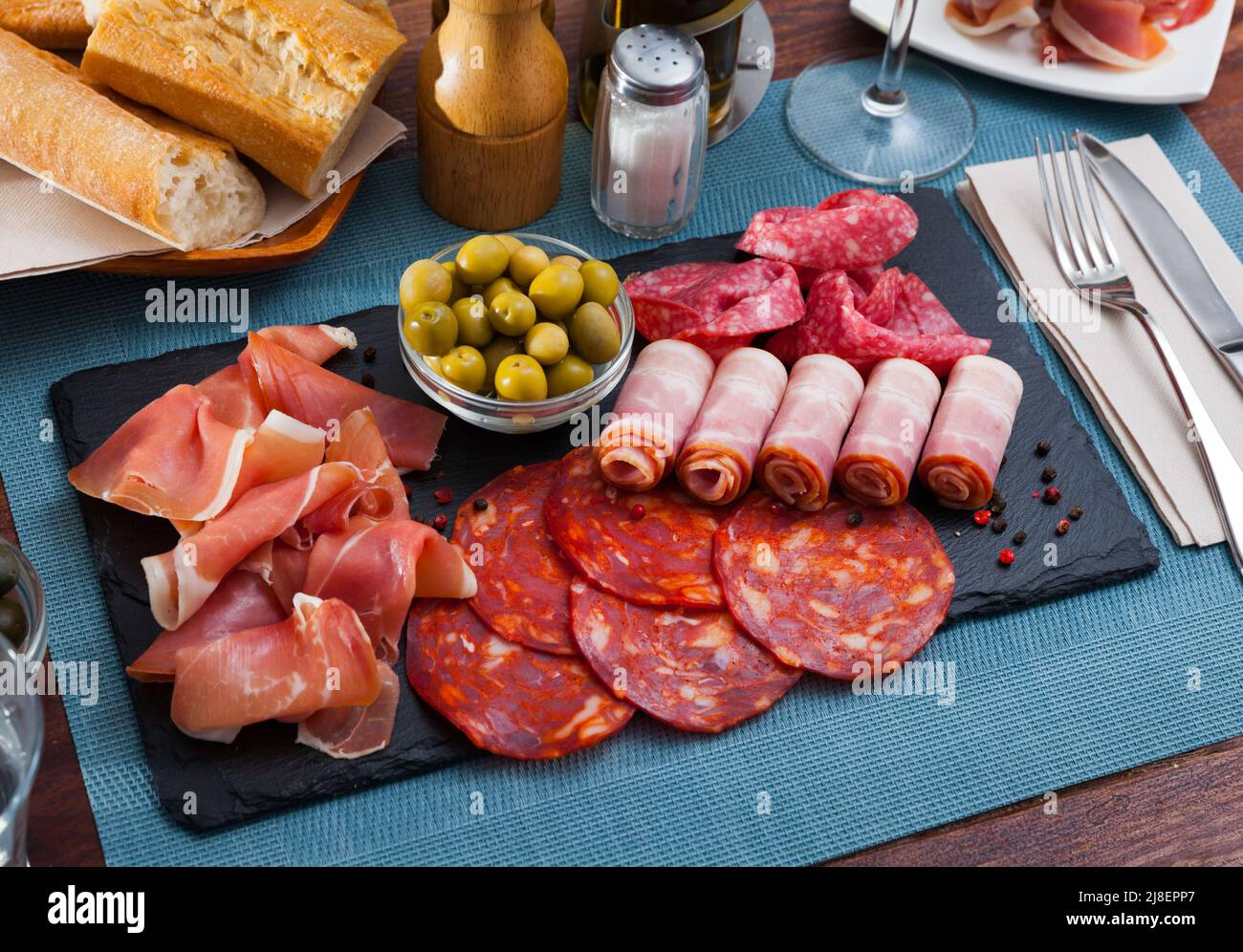 Spanish sausage sliced chorizo, fuet, jamon, salami, bacon Stock