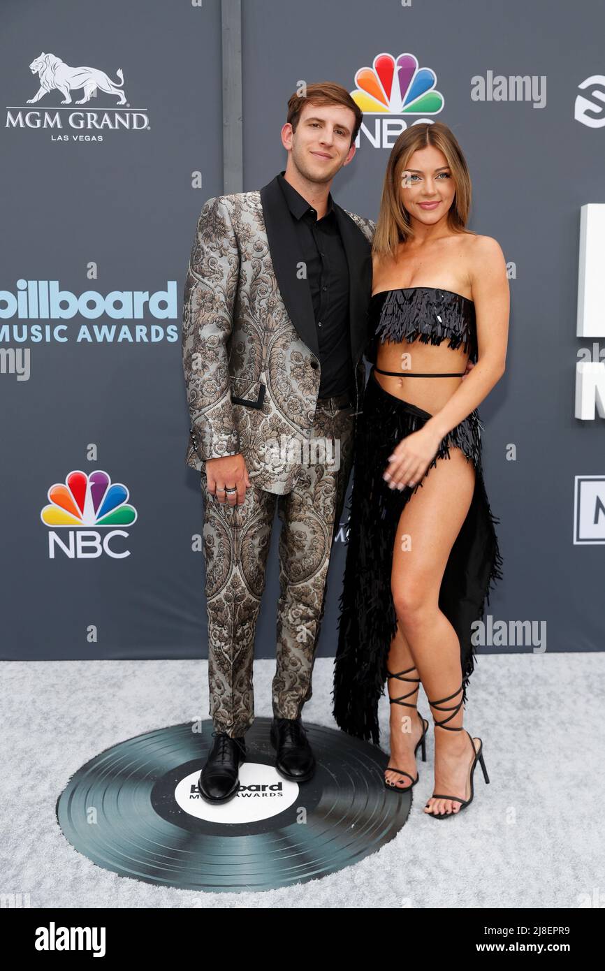 Illenium and Lara Ashley arrive to attend the 2022 Billboard Music Awards at MGM Grand Garden Arena in Las Vegas, Nevada, U.S. May 15, 2022. REUTERS/Steve Marcus Stock Photo