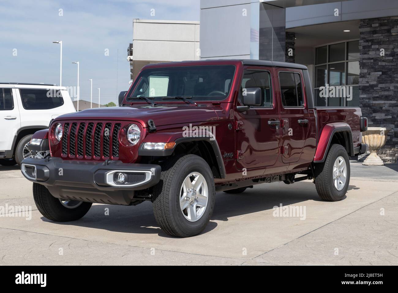 Kokomo - Circa May 2022: Jeep Gladiator display at a Stellantis dealer. The Jeep Gladiator models include the Sport, Willys, Rubicon and Mojave. Stock Photo