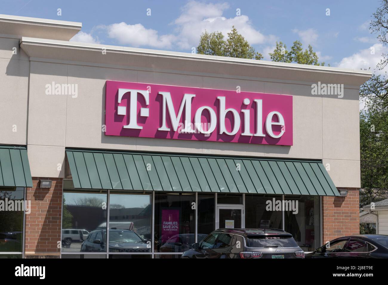 Elkhart - Circa May 2022: T-Mobile cell and mobile phone store. T-Mobile merged with Sprint to create a larger 5G internet and communications network. Stock Photo