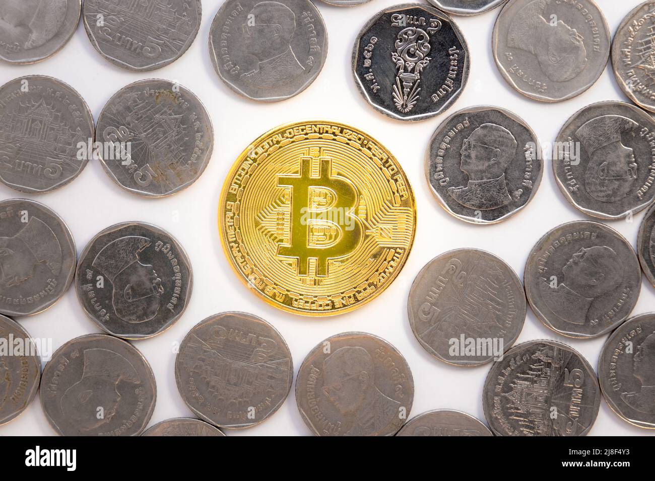 Bitcoin on 100 dollar bill background, gold coin of bitcoin on a hundred  dollar bill. Earnings on cryptocurrency mining Stock Photo - Alamy