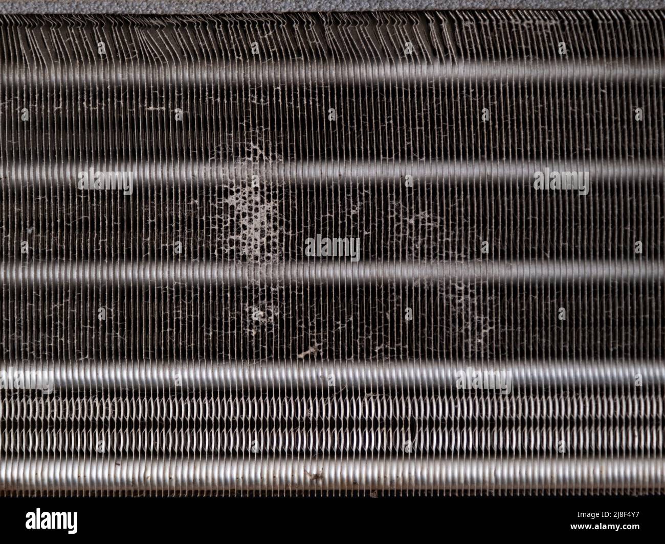 Close up of dirty air conditioner blower fan and coil. The blower of