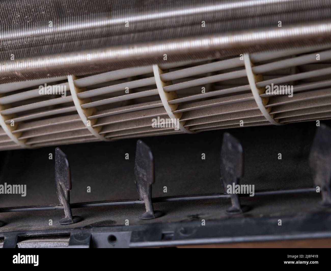 Close up of dirty air conditioner blower fan and coil. The blower of