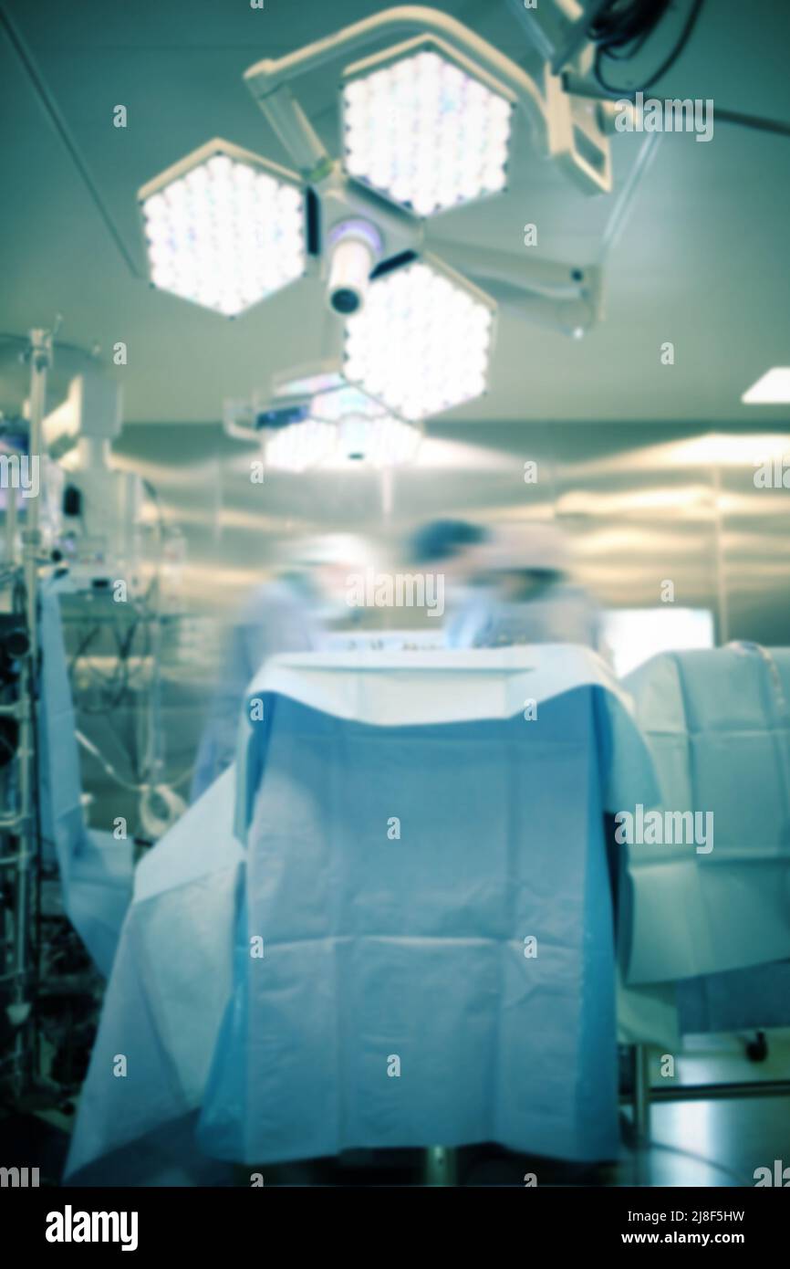 Surgeons work and operating light in the operating room. Blurred, abstract image for a surgical or medical background Stock Photo
