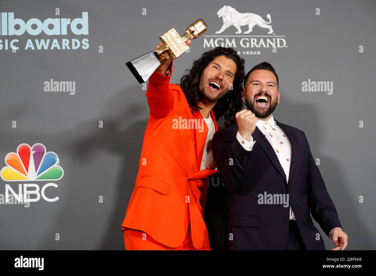 Shay Mooney and Dan Smyers of Dan + Shay pose with the award for Top Country Duo/Group in the photo room during the Billboard Music Awards in Las Vegas, Nevada U.S. May 15, 2022. REUTERS/Steve Marcus Stock Photo